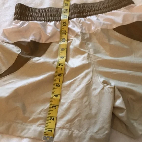 North Face Women's Tan Shorts with Brown Waistband - Picture 6 of 7